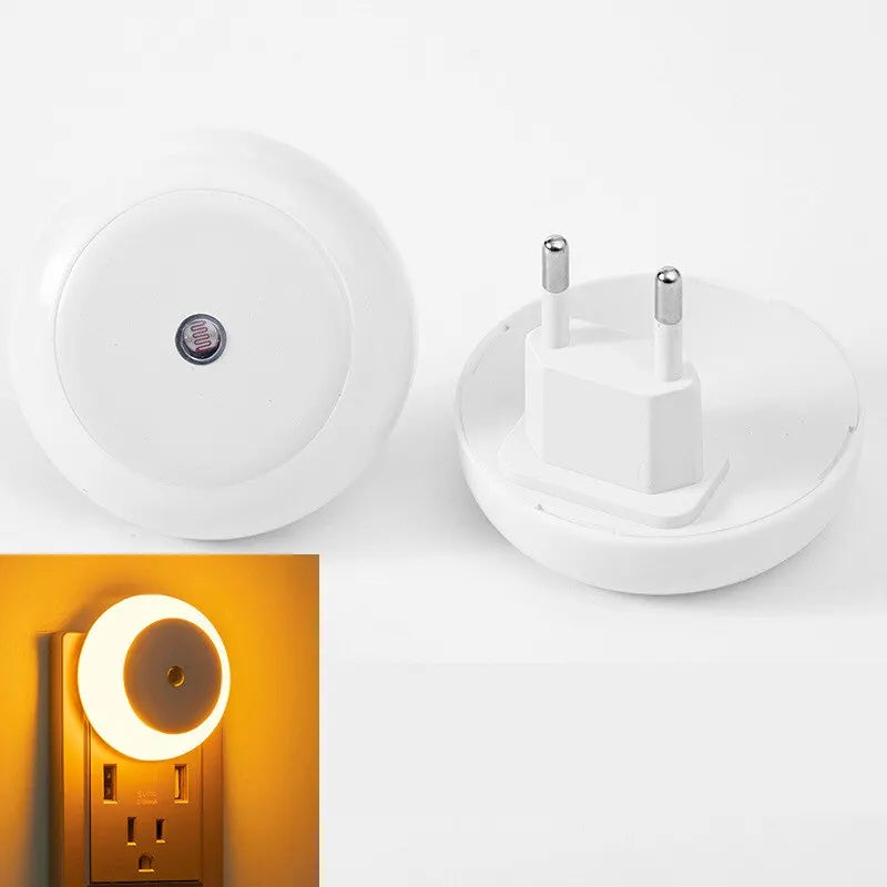 https://omnishop-col.com/products/lampara-de-pared-inteligente-con-sensor-de-anochecer-a-amanecer-luz-nocturna-blanca-redonda-led-para-bano-dormitorio-hogar-cocina-pasillo-ahorro-de-energia-enchufe-de-la-ue